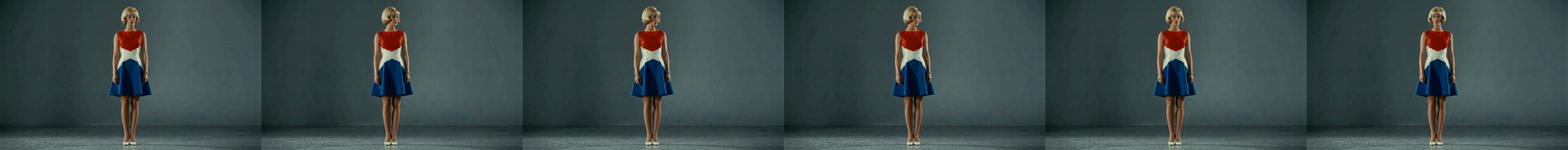 Six frames from arm D. The same blonde woman in the same dress, standing.